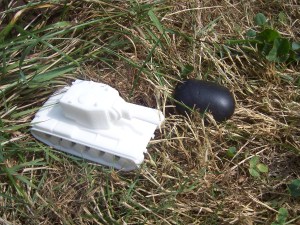 The rock is black, the tank is white ...