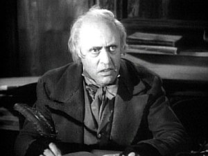 Alastair Sim as Scrooge