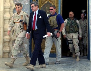 Imperial Proconsul Bremer, desert boots and all, in a distinctly American moment