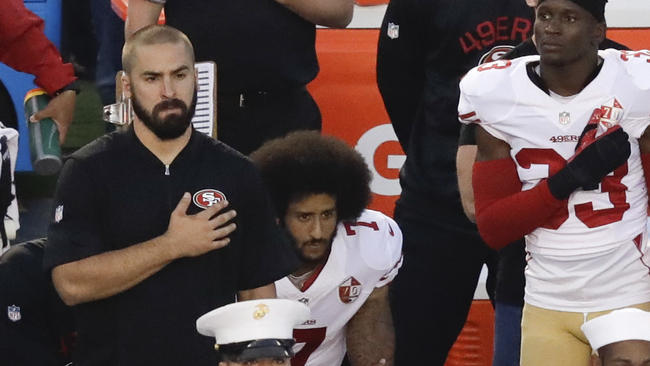 Kaepernick sitting during national anthem